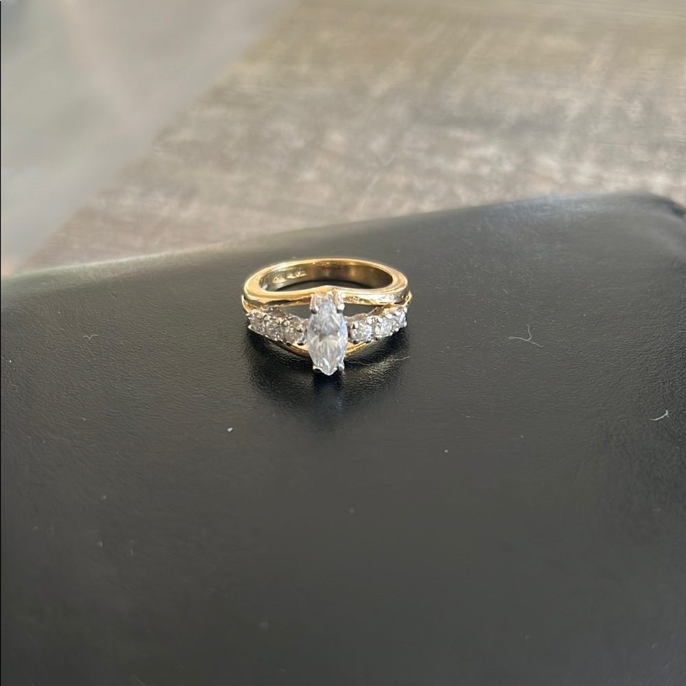 Elegant Gold Ring with Clear Gemstones